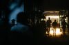 Pedestrians are silhouetted as they walk along a footbridge in the Central district of Hong Kong, China, on Monday, June 27, 2016. The relief rally endured, with Asian stocks, commodities and high-yielding currencies rising amid speculation policy makers will blunt the impact of the U.K.’s decision to leave the European Union with stimulus measures.