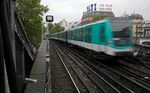 A Paris metro train running on Line 2, which crosses Northern Paris.