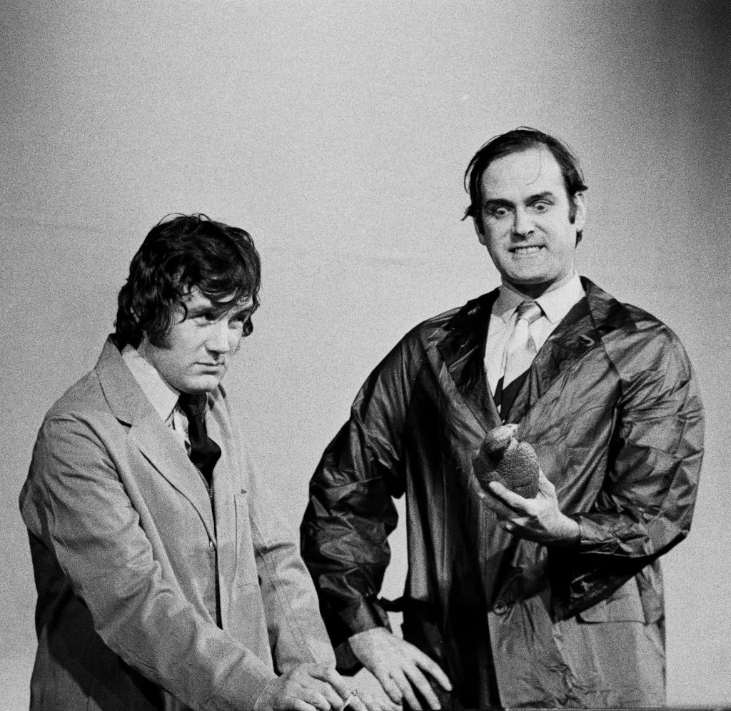 Michael Palin and&nbsp;John Cleese on stage in London, 1974.