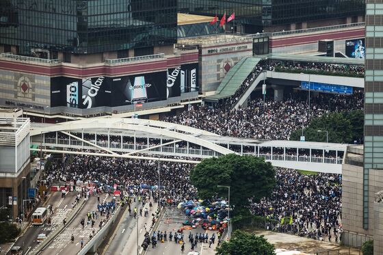 Lam Urges a Return to Order After Protests: Hong Kong Update