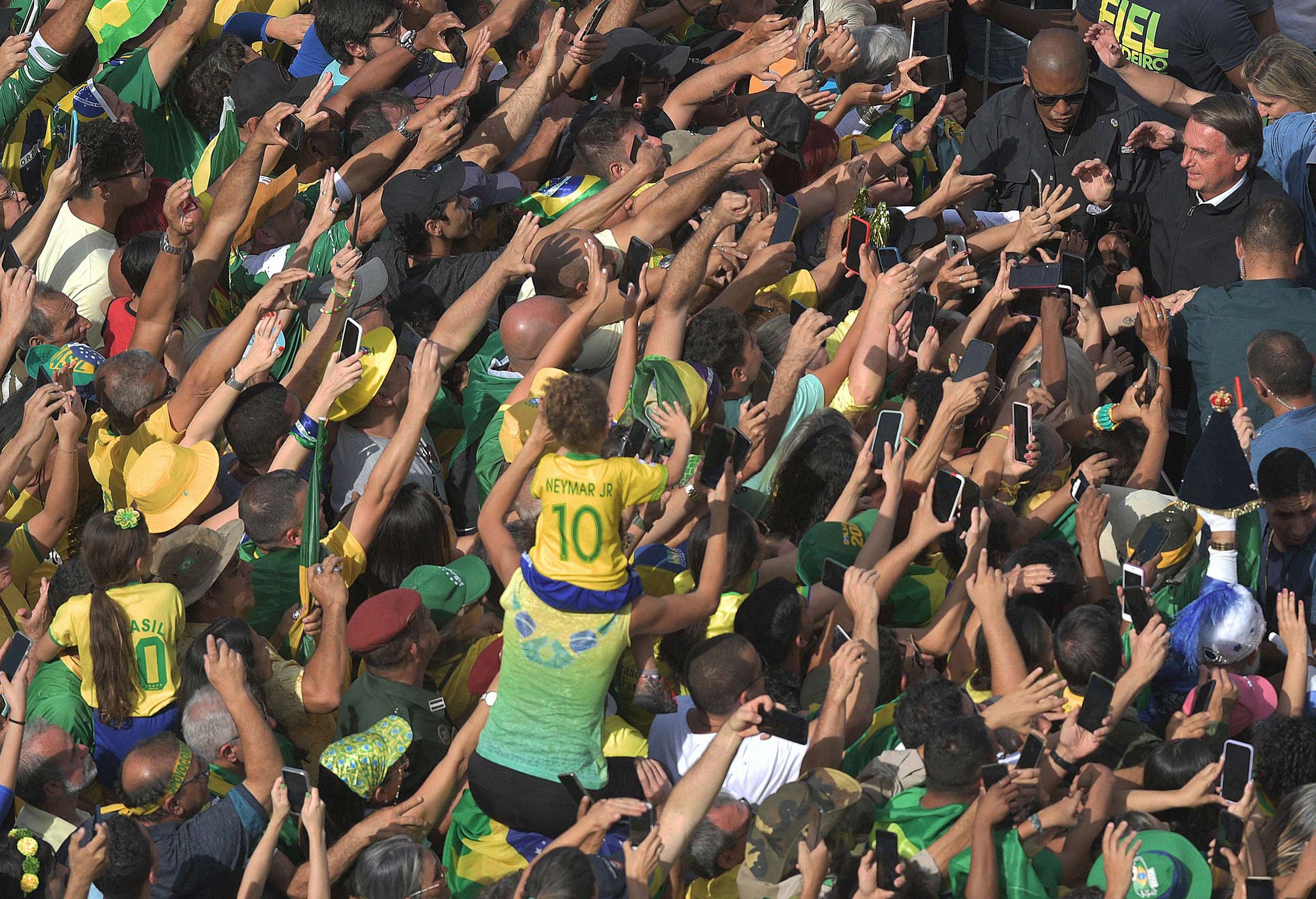 Brazilian President Jair Bolsonaro (top right) greets supporters during celebrations to mark the country’s 200th anniversary of independence&nbsp;at Copacabana Beach in Rio de Janeiro&nbsp;on Sept. 7.