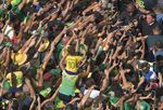 Brazilian President Jair Bolsonaro (top right) greets supporters during celebrations to mark the country’s 200th anniversary of independence at Copacabana Beach in Rio de Janeiro on Sept. 7.