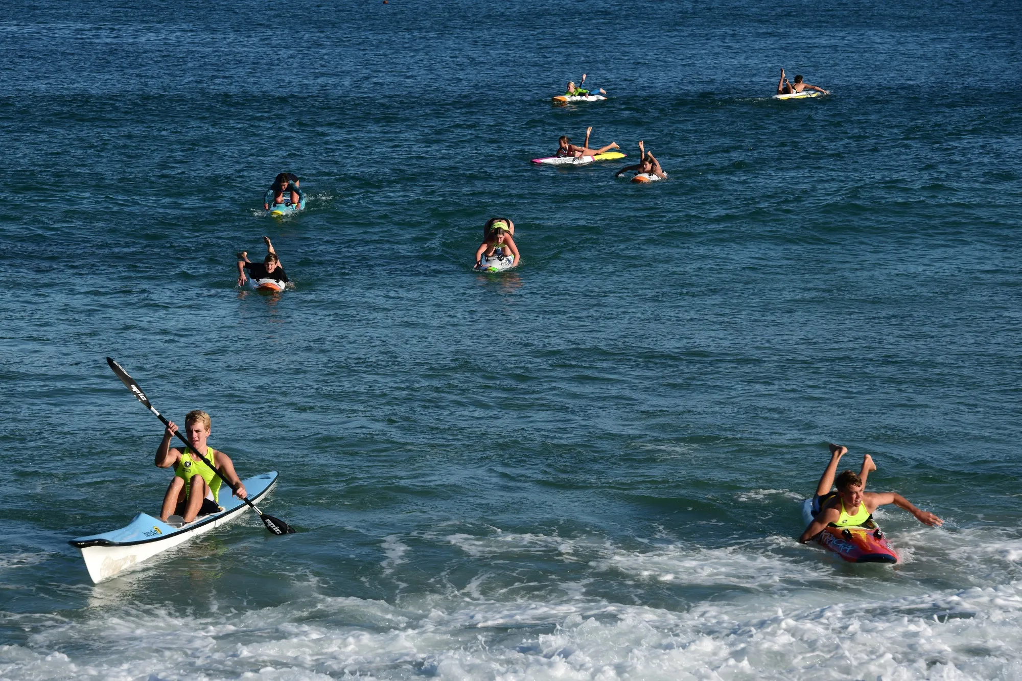 People paddle board and kayak in Cottesloe, Australia, on May 9.