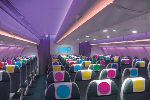 An artist's impression showing the interior of a POP Airline aircraft.