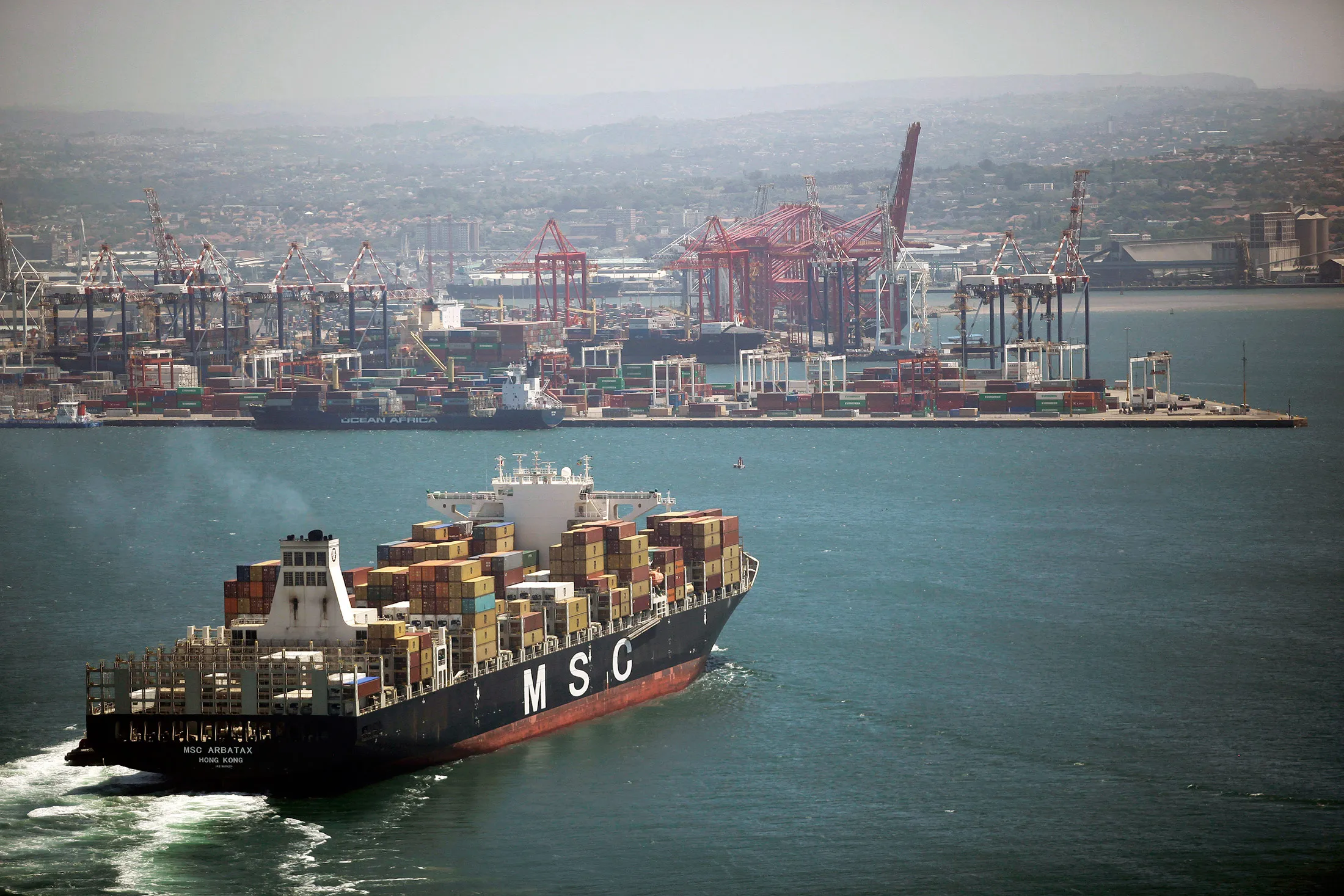 A container ship approaches the Port of Durban.
