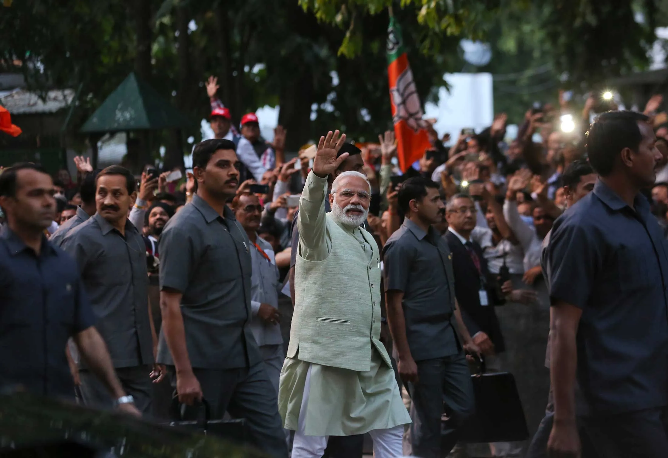 Indian Prime Minister Narendra Modi waves as he arrives at BJP headquarters in New Delhi on March 12, 2017, a day after the party’s landslide victories in key state legislature elections .