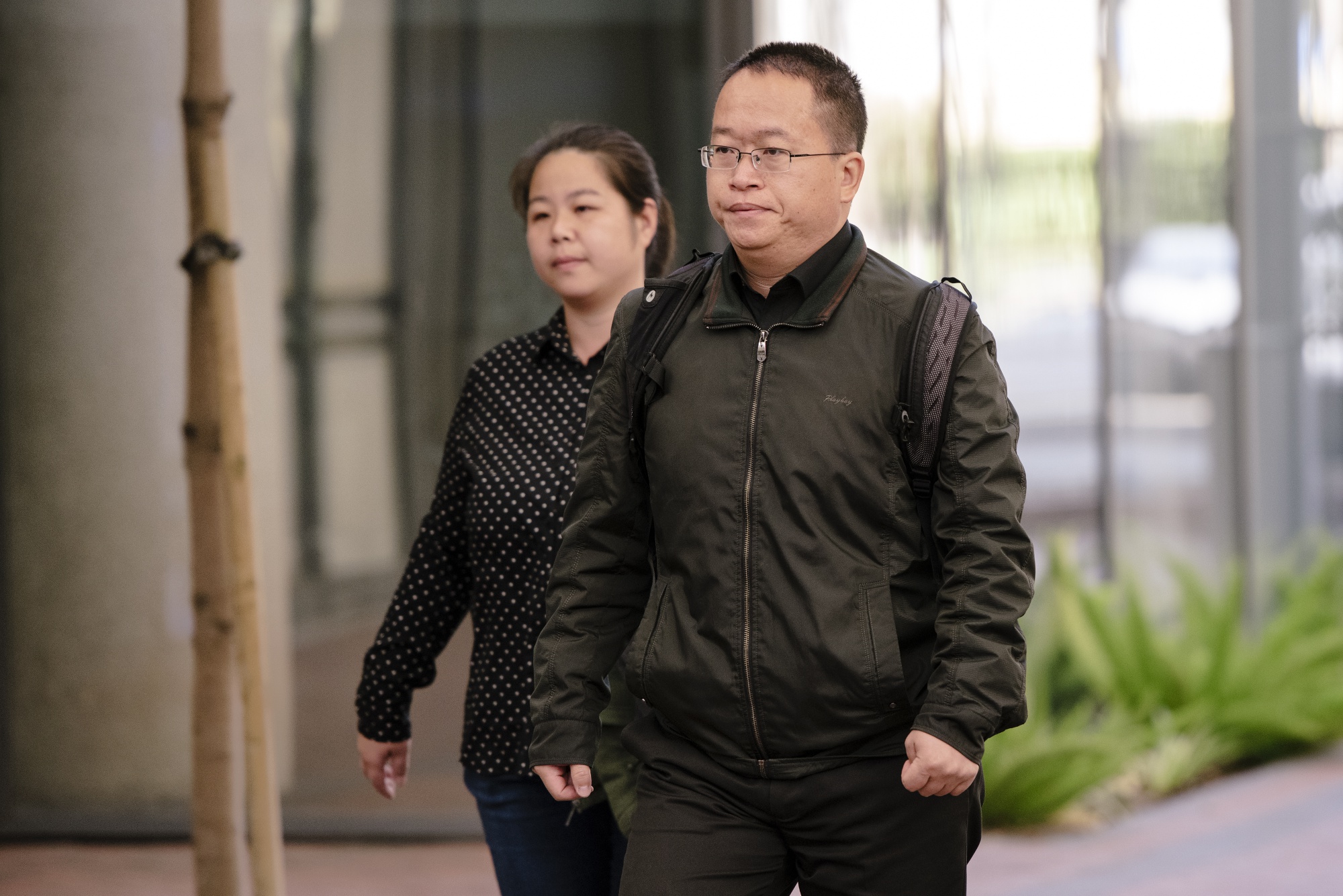 Hao Zhang arrives at federal court in San Jose on Oct. 2.