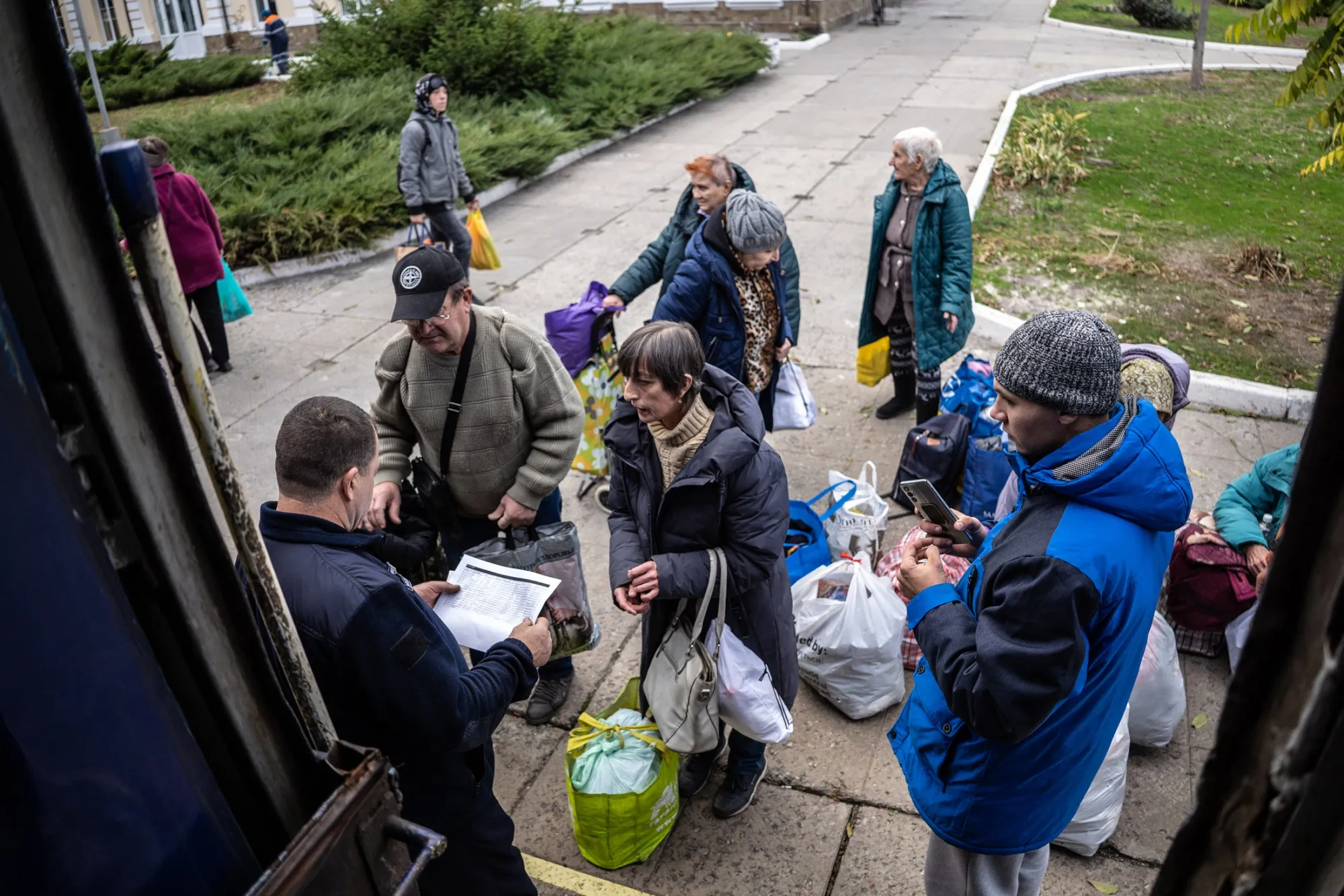 Civilians prepare for evacuation from Pokrovsk, Ukraine, on Oct. 28.