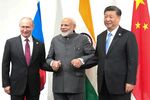 Russian President Vladimir Putin, Indian Prime Minister Narendra Modi and Chinese President Xi Jinping hold a meeting on the sidelines of the G20 summit in Osaka on June 28, 2019. (Photo by Mikhail KLIMENTYEV / SPUTNIK / AFP) (Photo credit should read MIKHAIL KLIMENTYEV/AFP via Getty Images)