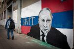 A street mural reading &quot;Brother&quot; depicts Vladimir Putin, in Belgrade, Serbia.