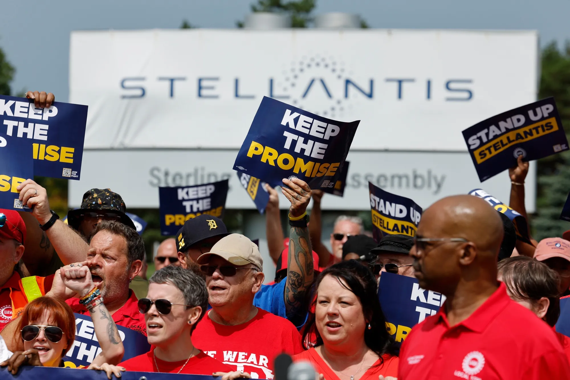 UAW members participate in a rally outside the Stellantis Sterling Heights Assembly Plant in Sterling Heights, Michigan, in Aug.