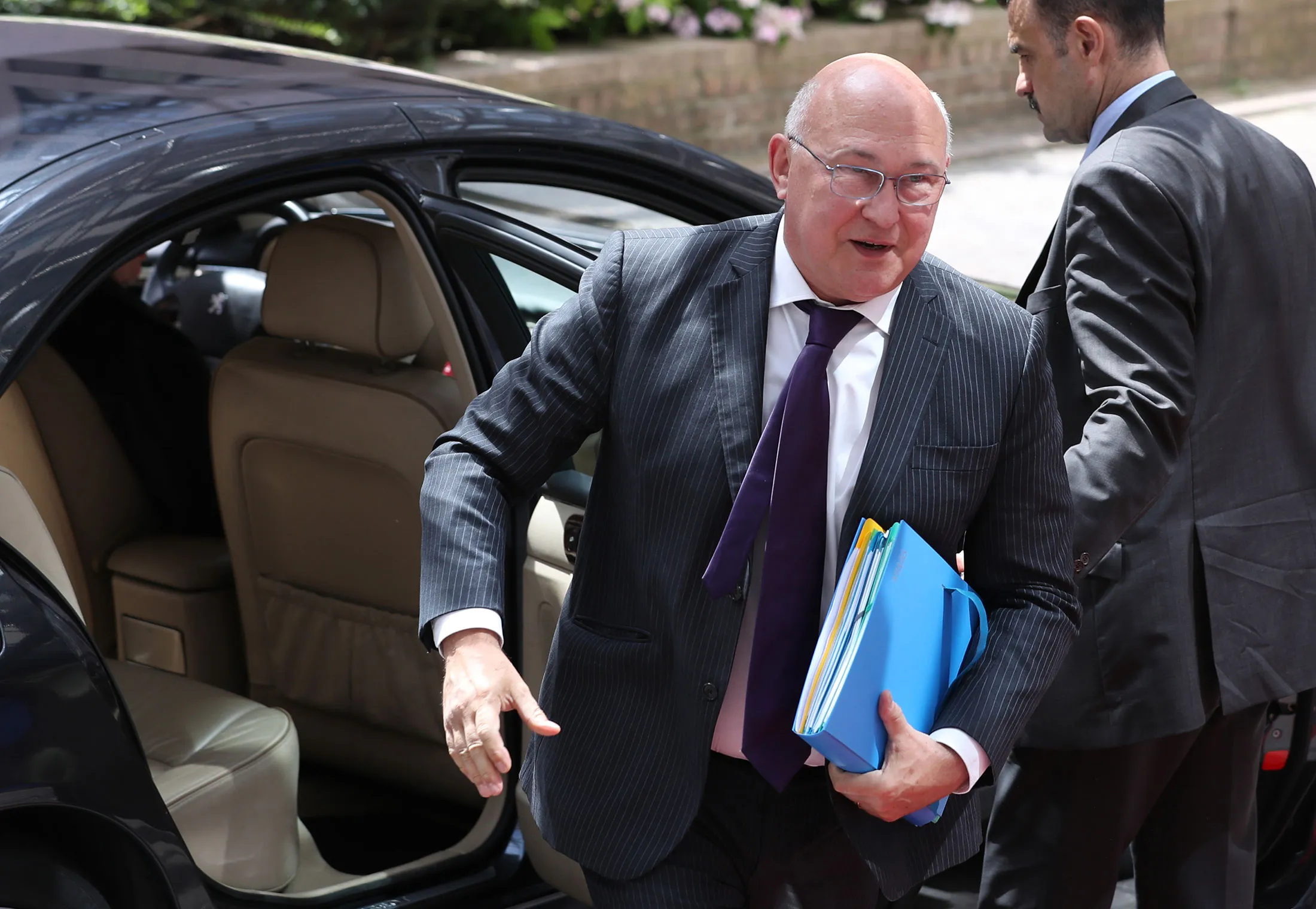Michel Sapin, France's finance minister, arrives for a Eurogroup meeting of European finance ministers in Brussels, Belgium, on Monday, July 11, 2016. Europe urgently needs a 150 billion-euro ($166 billion) bailout fund to recapitalize its beleaguered banks, particularly those in Italy, Deutsche Bank AGs chief economist said in an interview with Welt am Sonntag. Photographer: Jasper Juinen/Bloomberg
