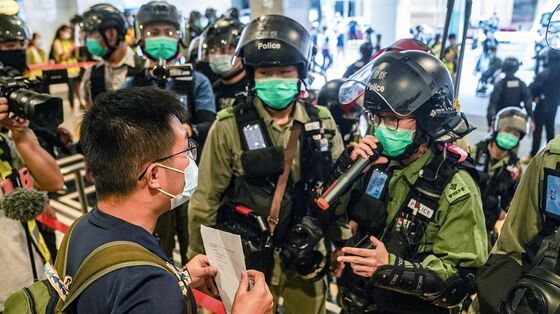 Hong Kong Justice Chief Vows to Try and Prosecute Cases Locally
