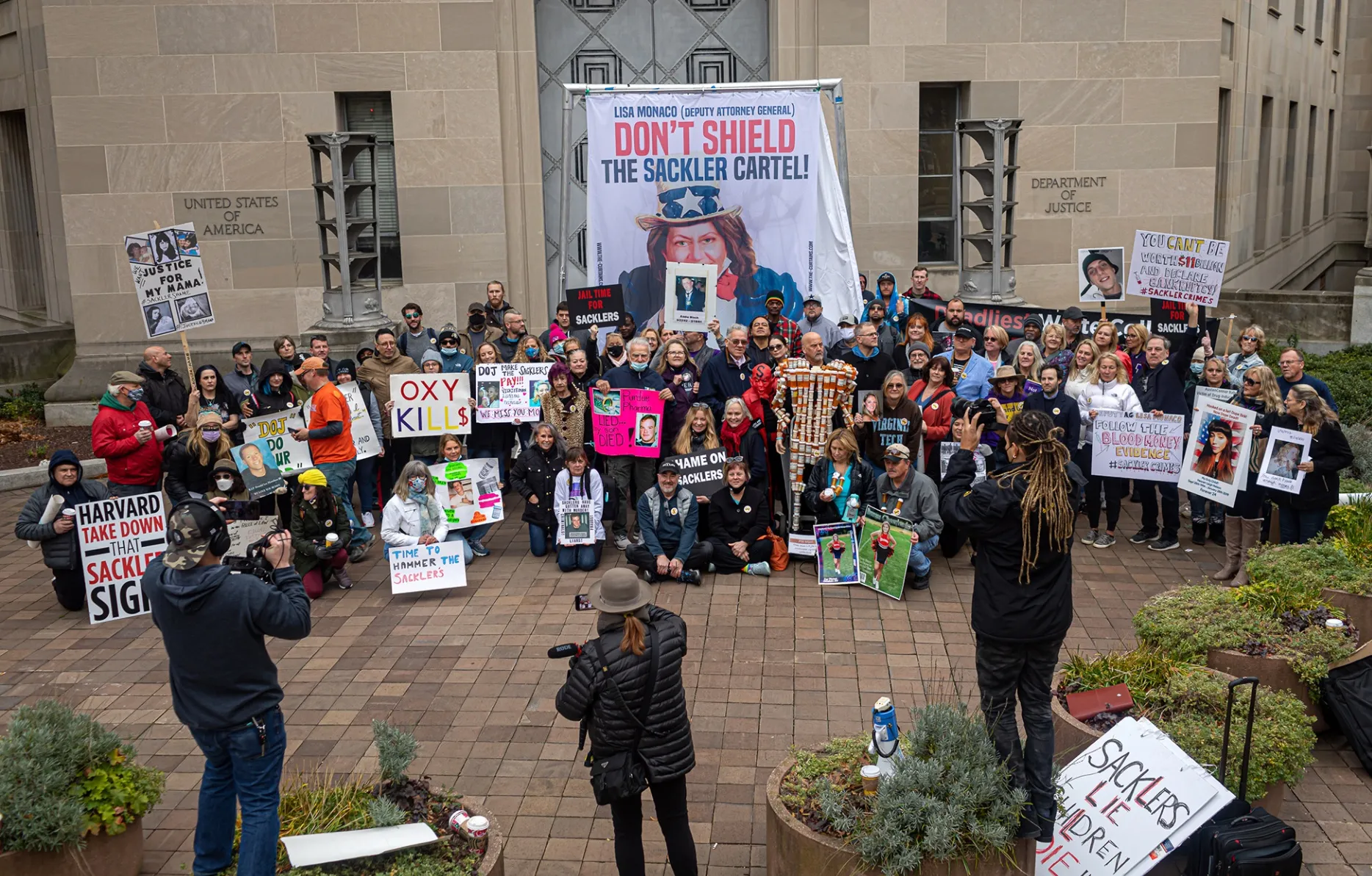 People who have lost loved ones due to the opioid epidemic rally outside&nbsp;the Department of Justice in Washington D.C., on Dec. 3, 2021.&nbsp;