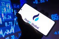 In this photo illustration the Huobi logo seen displayed on