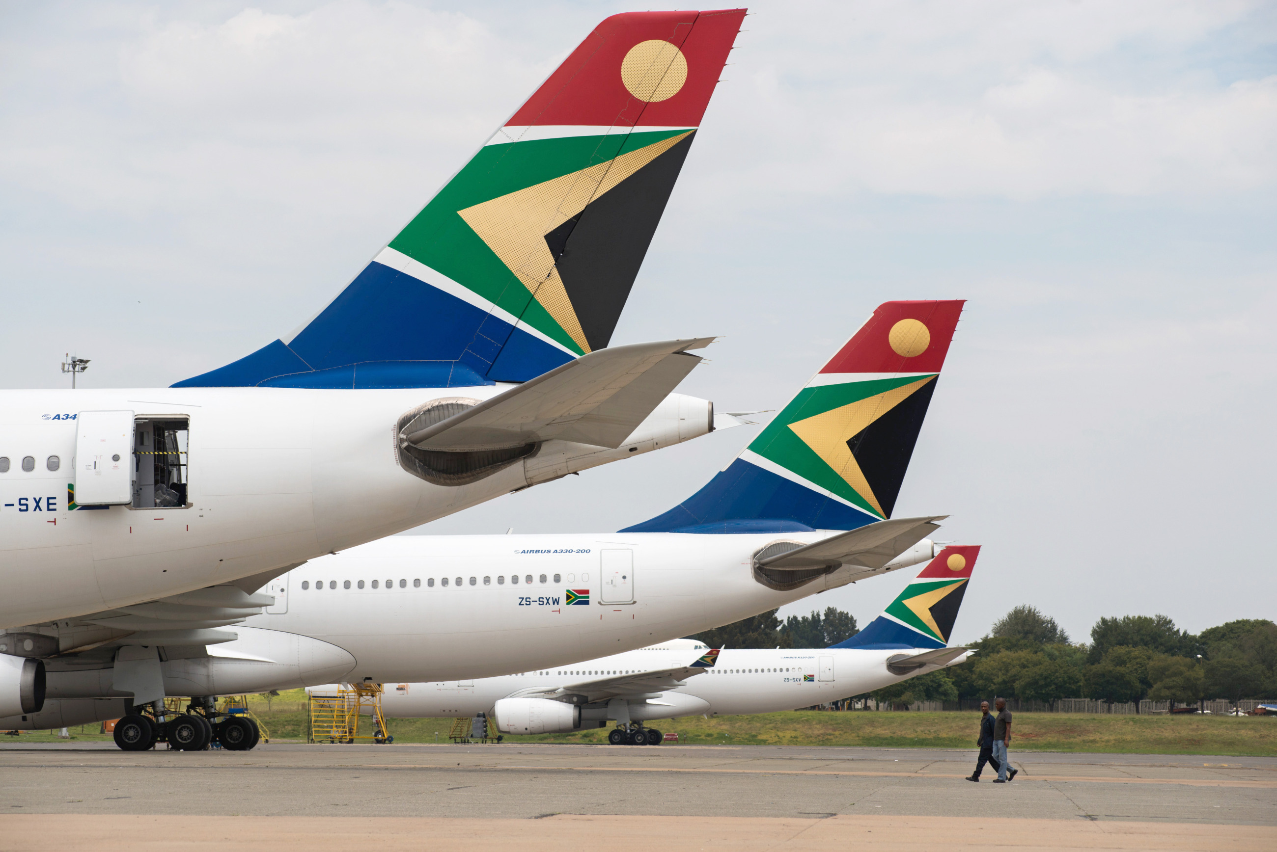 South African Airways aircraft sit at O.R. Tambo International airport in Johannesburg.