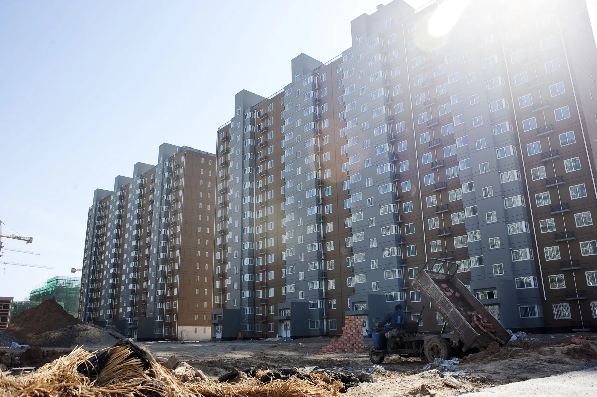 Construction continues on the site of China Vanke Co.'s 'Fun City' apartment complex in Beijing, China.
