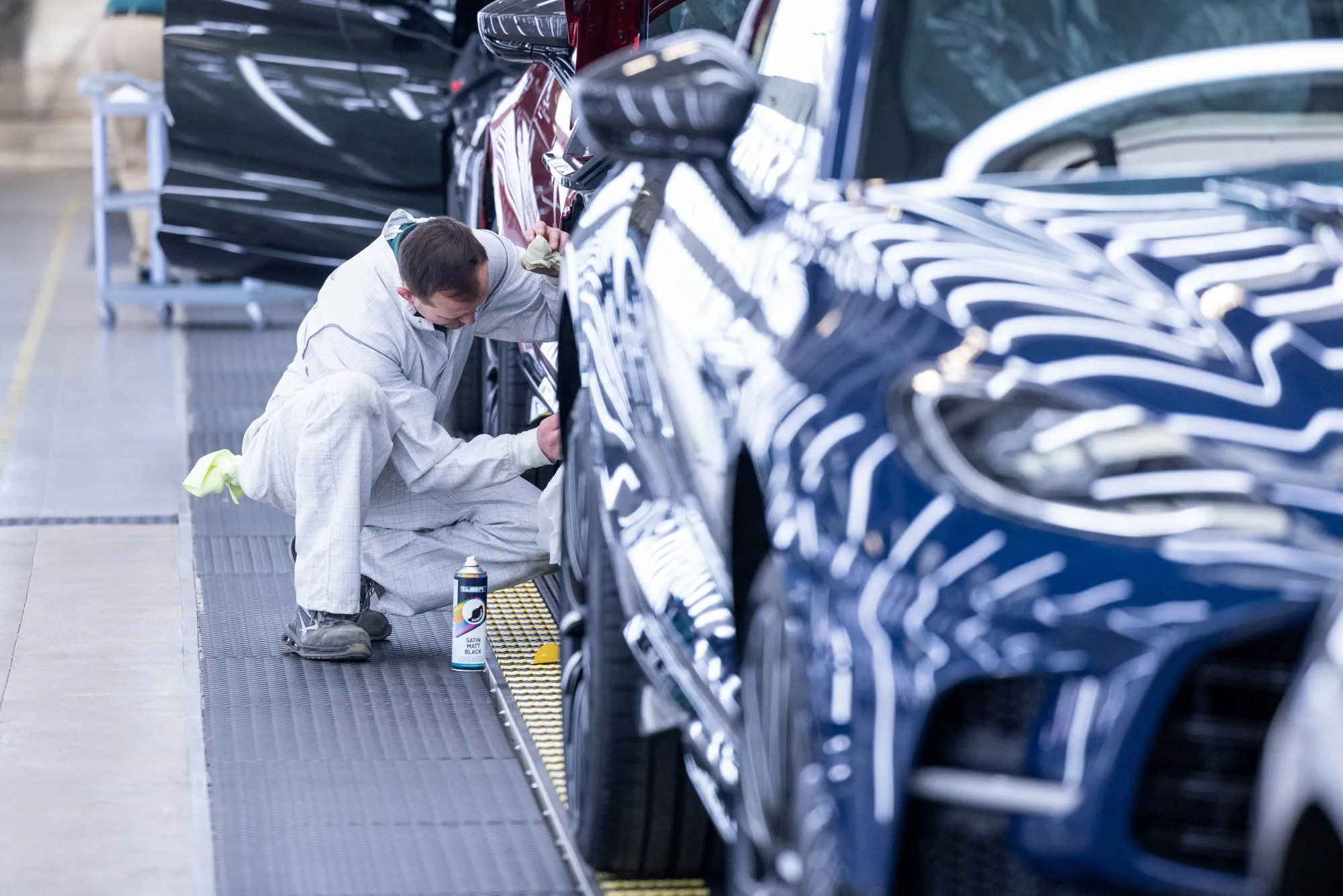 An employee works on a an Aston Martin&nbsp;at the Aston Martin Lagonda Global Holdings Plc factory in St Athan, UK.