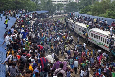 Overcrowded trains at Airport Railway Station in Dhaka.