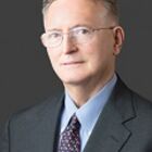 Headshot of James E Ledbetter