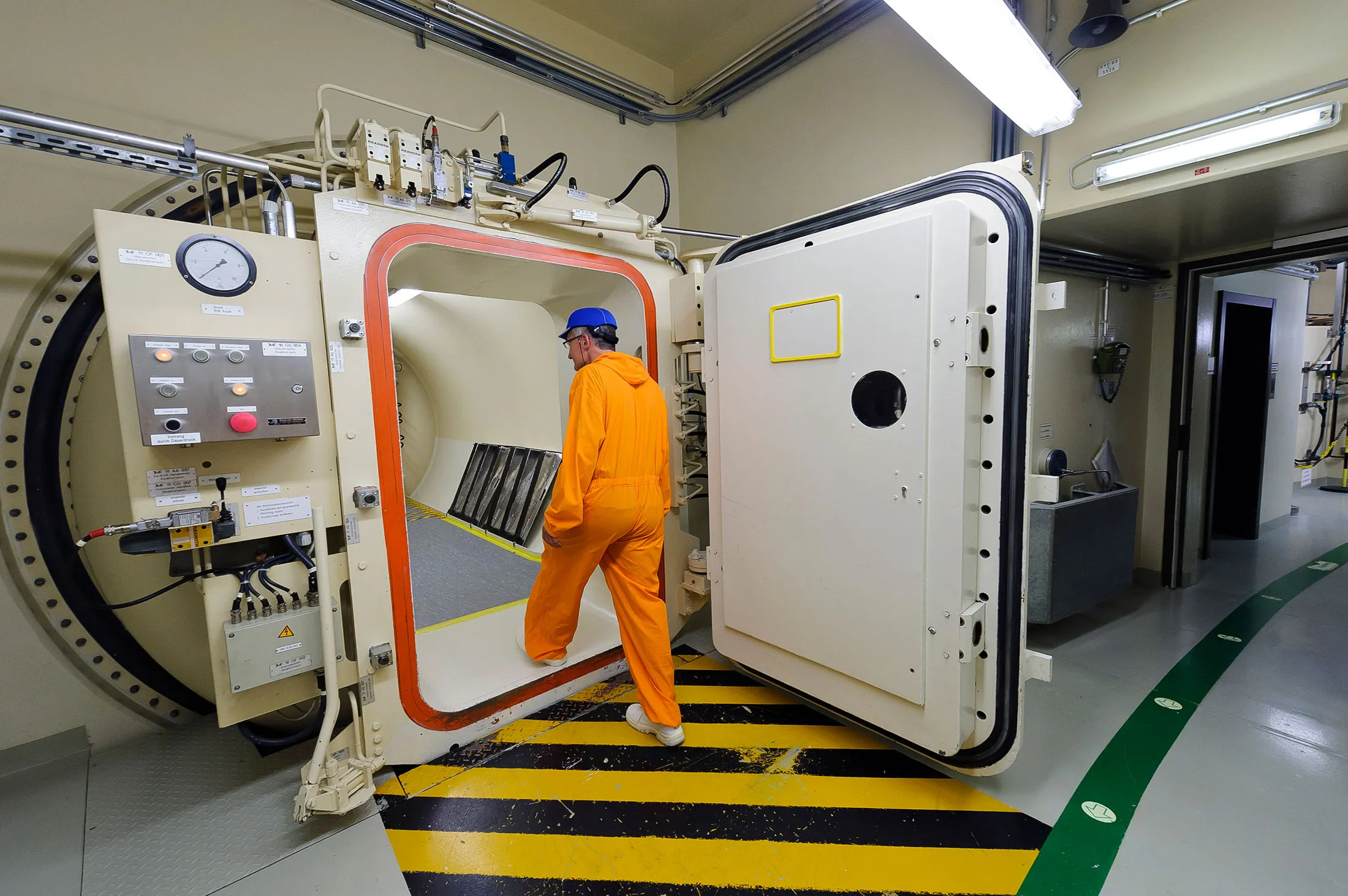 An employee exits the reactor chamber at RWE’s Emsland nuclear power plant in Lingen, Germany.
