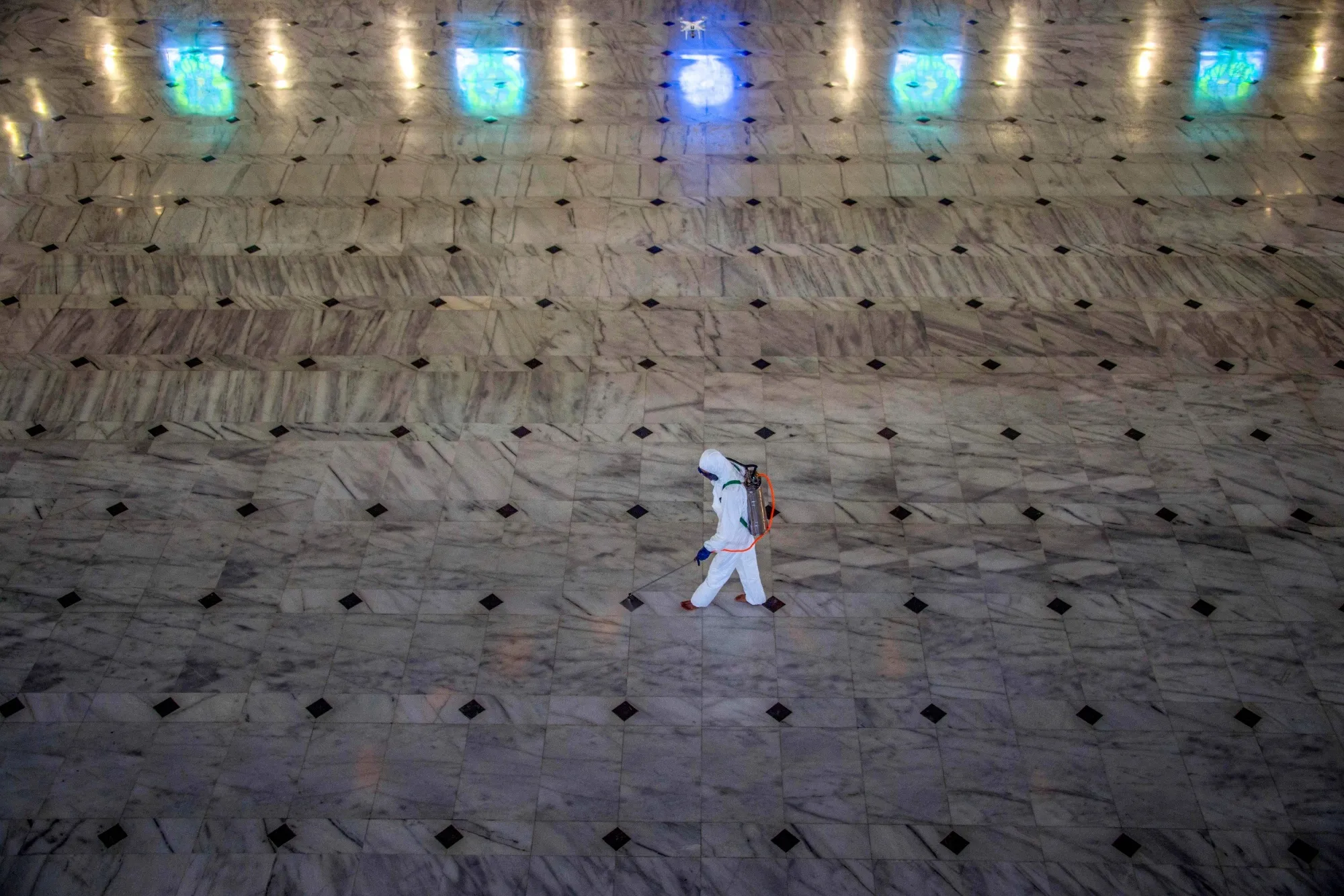 Disinfectant is sprayed at a mosque in Surabaya, Indonesia, on March 17.