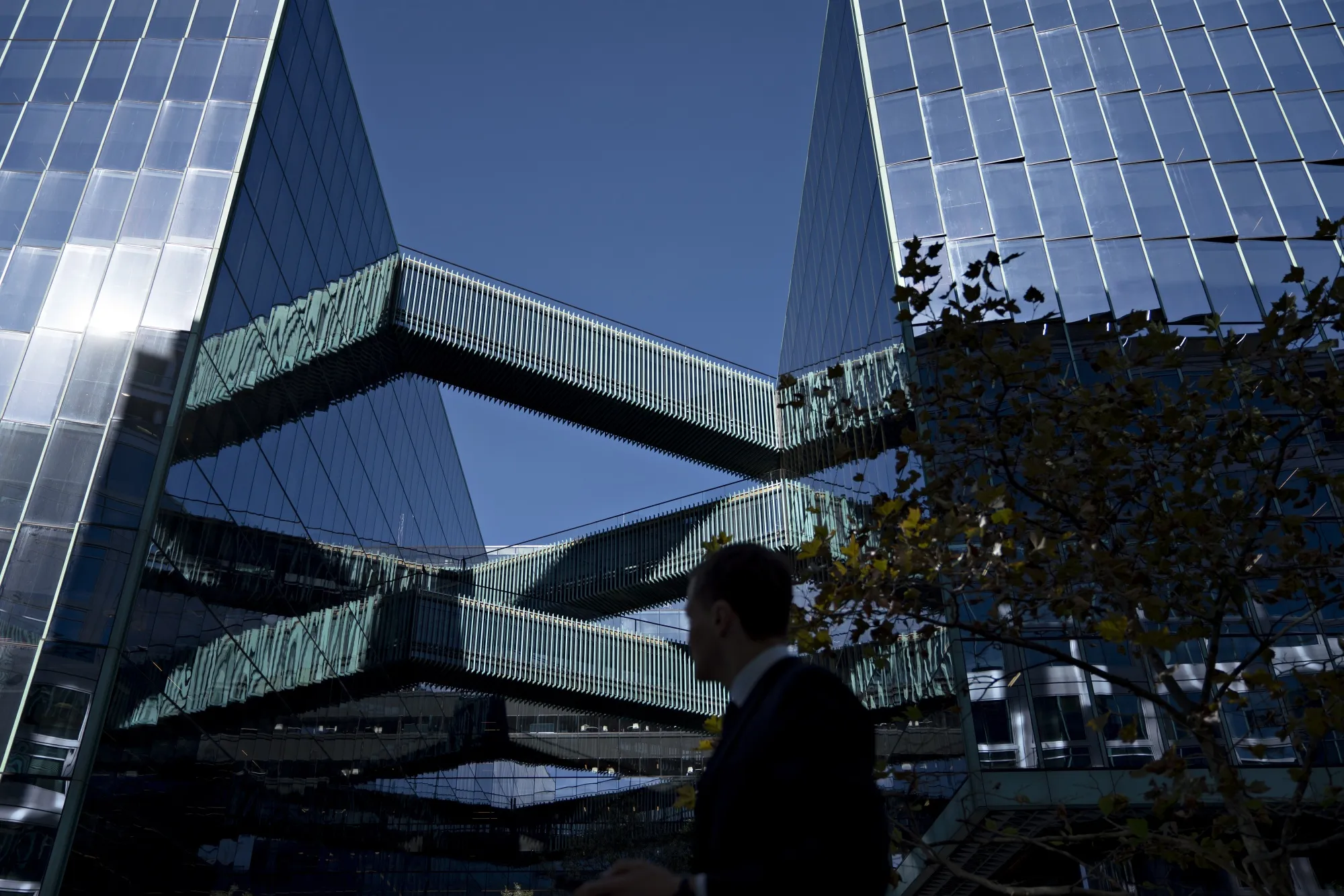 A pedestrian walks past the Fannie Mae&nbsp;headquarters in Washington.