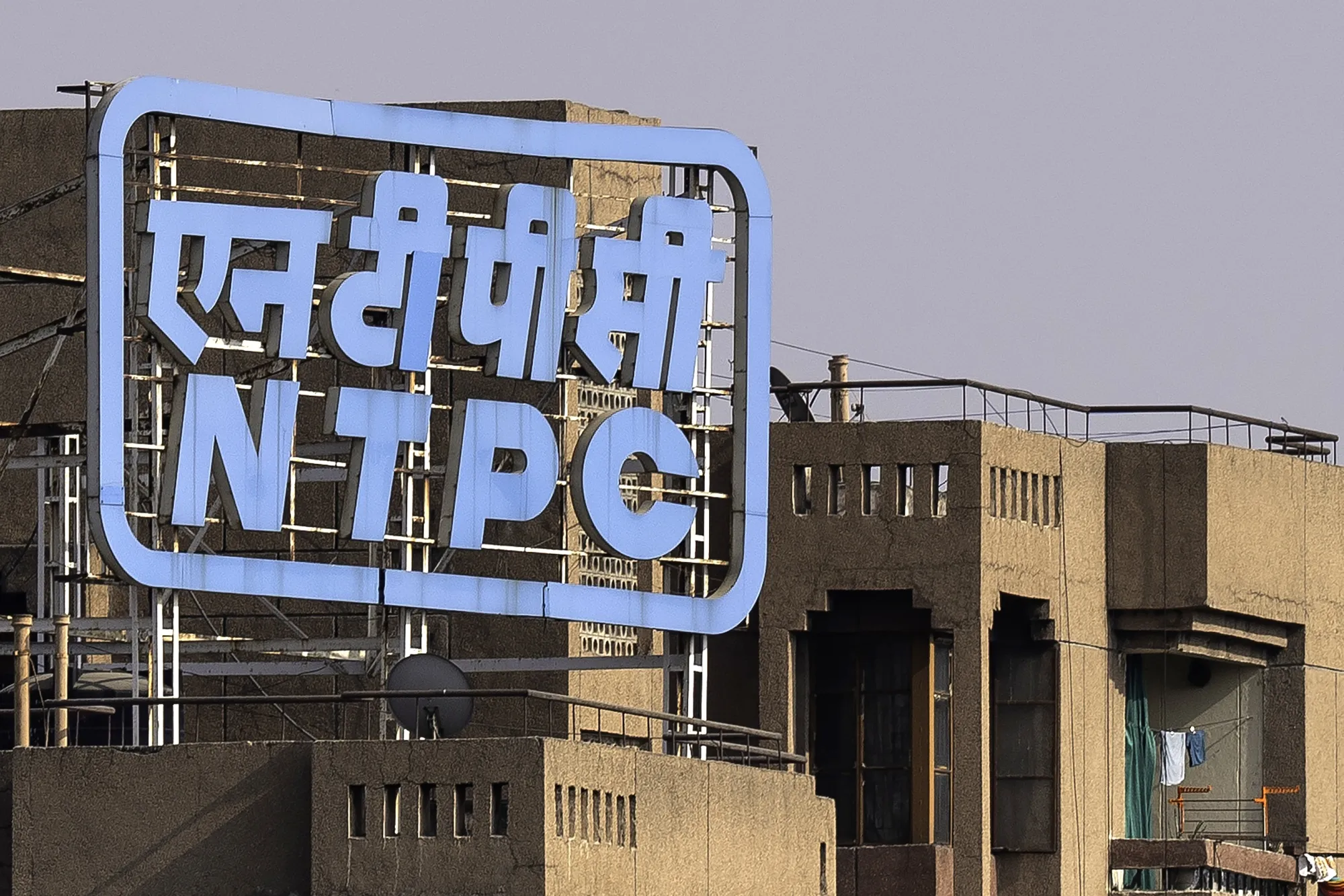 The NTPC Ltd. logo on a building in Noida, Uttar Pradesh, India.