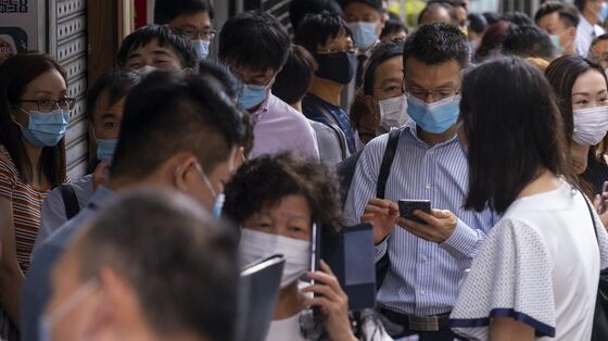 Hong Kong Birthday Bash Lands 30 Officials in Quarantine