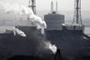 Steam rises from pipes at a JFE Steel Corp. plant in Chiba, Japan, on Tuesday, March 13, 2018. Japanese Trade Minister Hiroshige Seko called on the U.S. to exclude Japan from the U.S. tariffs, stating that Japanese steel and aluminum exports don’t have any negative effects on U.S. national security, and contribute to American industry and jobs, according to the ministry.