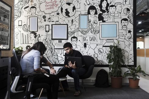 Employees work at the Rivigo headquarters in Gurgaon.