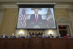 A video of Donald Trump is played on a screen during a hearing of the Select Committee to Investigate the January 6th Attack on the US Capitol in October. 