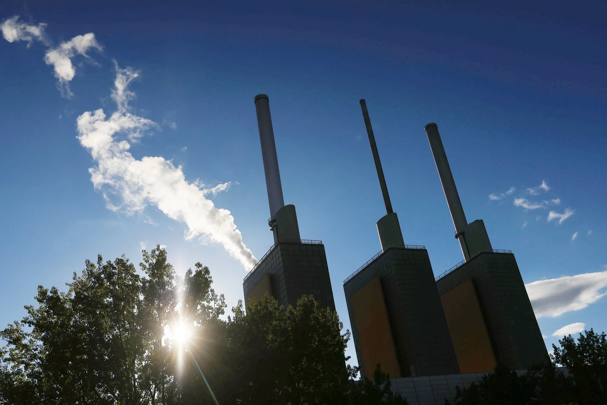 The towers of the Linden gas-fired combined heat and power plant in Hanover.