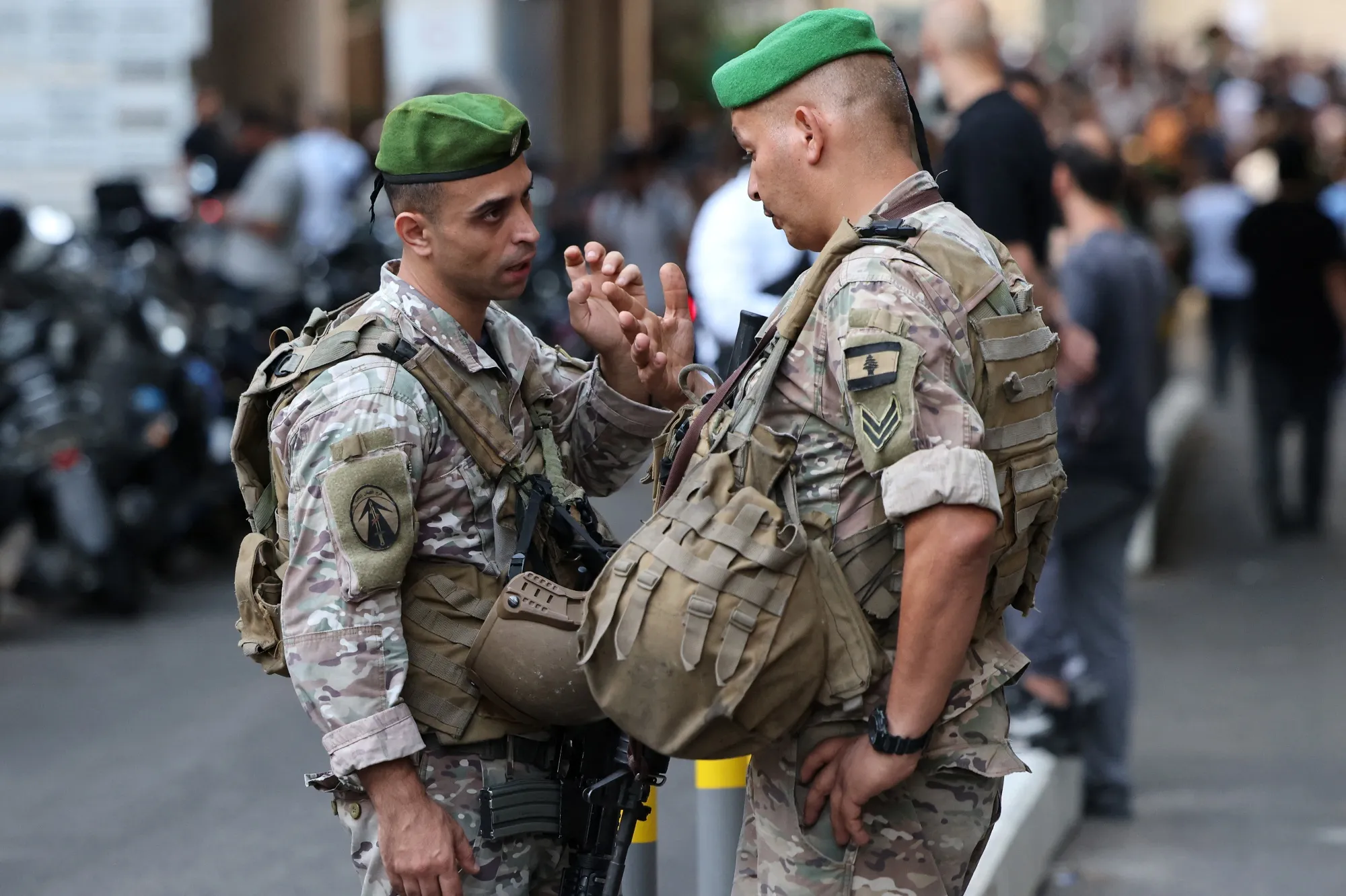 Lebanese army soldiers stand guard at the entrance of a hospital in Beirut on September 17, 2024.