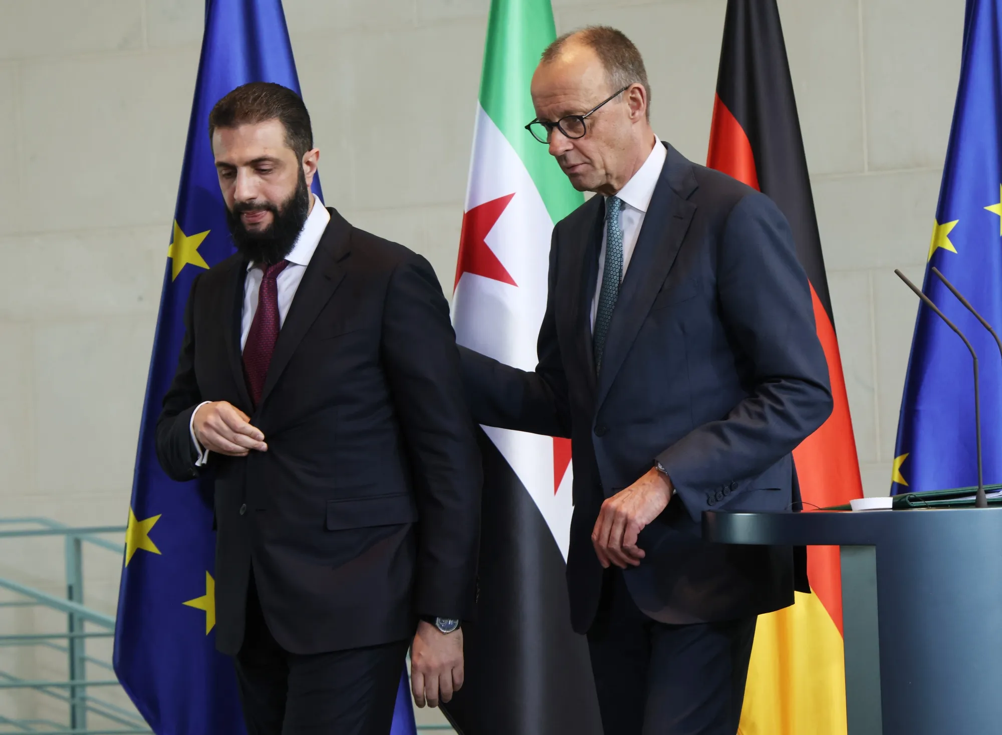 Ahmed al-Sharaa, left, and Friedrich Merz on March 30.