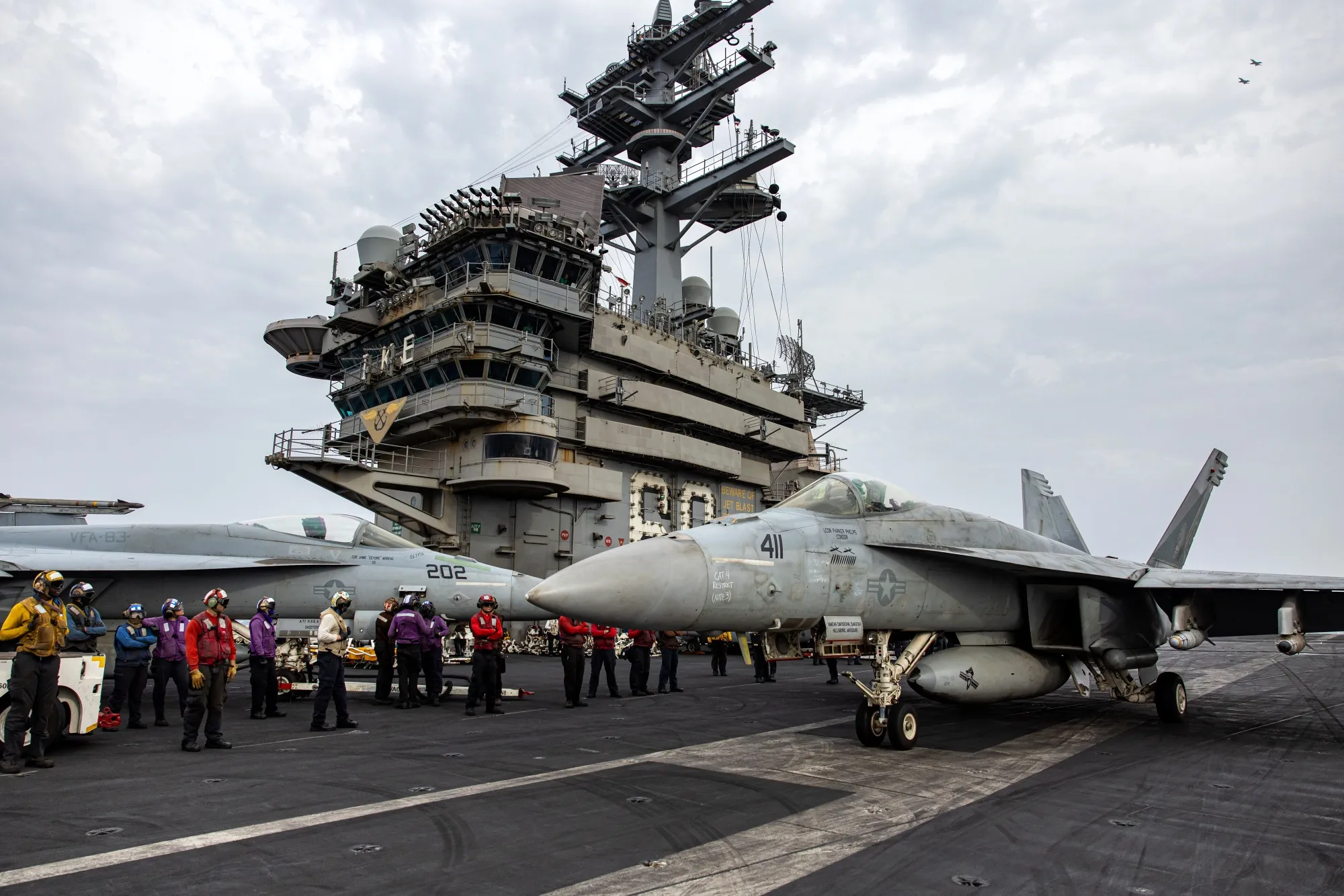 A fighter jet on the flight deck of the USS Dwight D. Eisenhower aircraft carrier in the&nbsp; Red Sea on March 19.