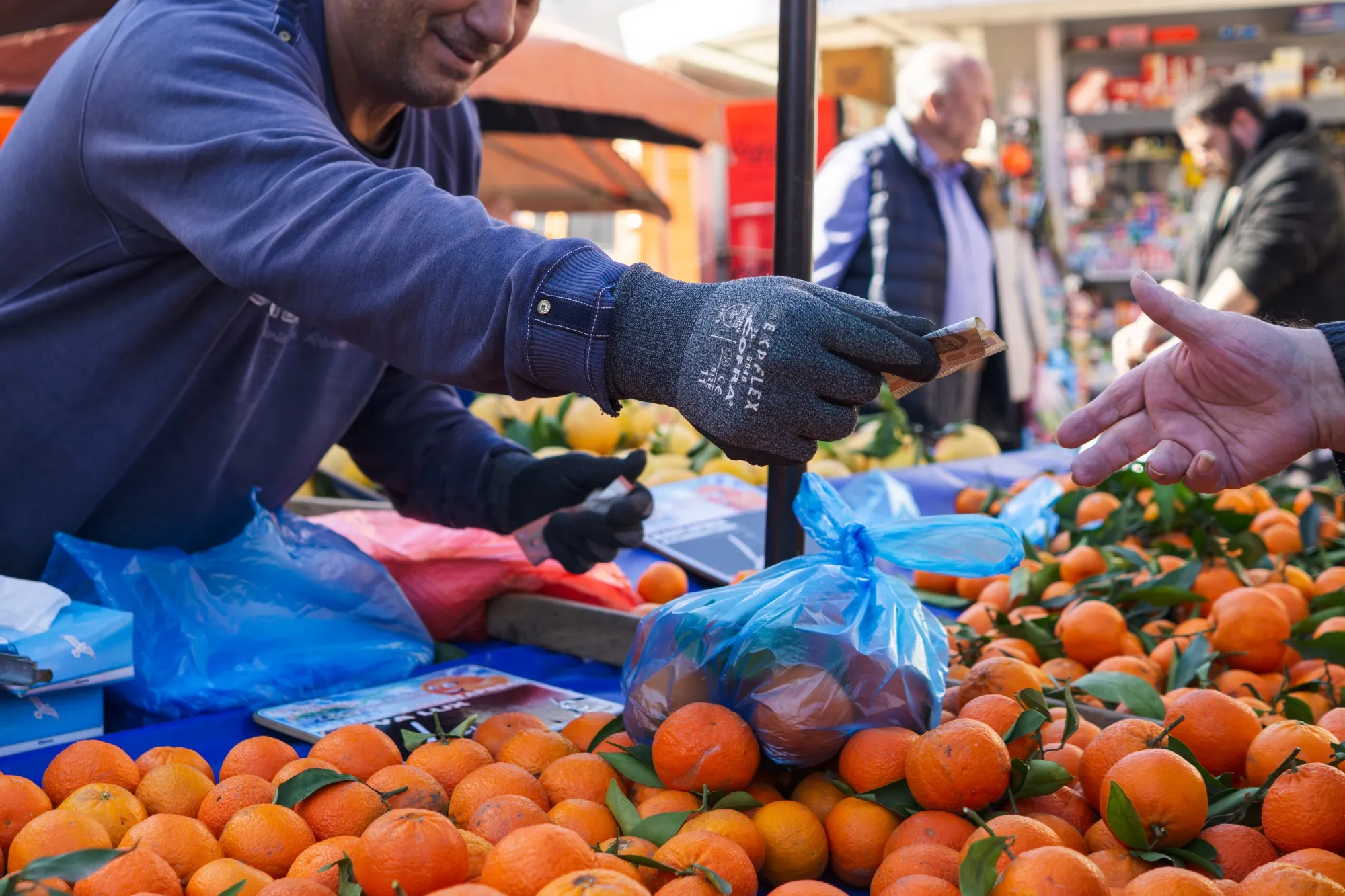 Greece will impose a profit margin cap on fuel and groceries.