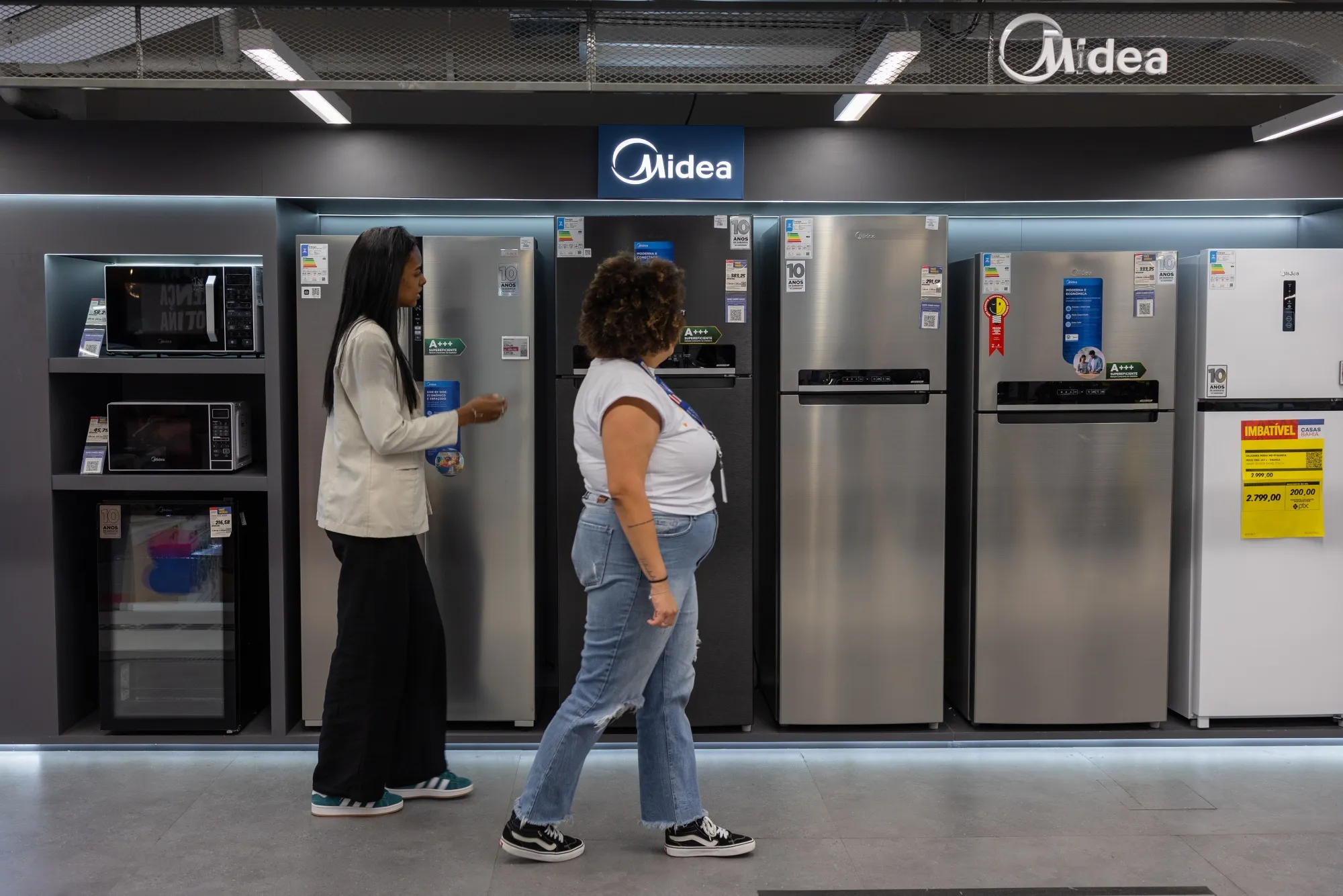 Shoppers browse Midea Group Co. home appliances in a store in Sao Paulo, Brazil.