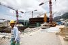 A worker walks near the Taishan 1 Areva SA EPR reactor at the China Guangdong Nuclear Power Group Co. atomic plant in Taishan, Guangdong Province, China, on Thursday, July 29, 2010. Guangdong Nuclear Power Group Co., the nation's second-biggest builder of atomic plants, hopes to build six reactors in Taishan, southern Guangdong province, Areva SA's China deputy president Eric Neisse.