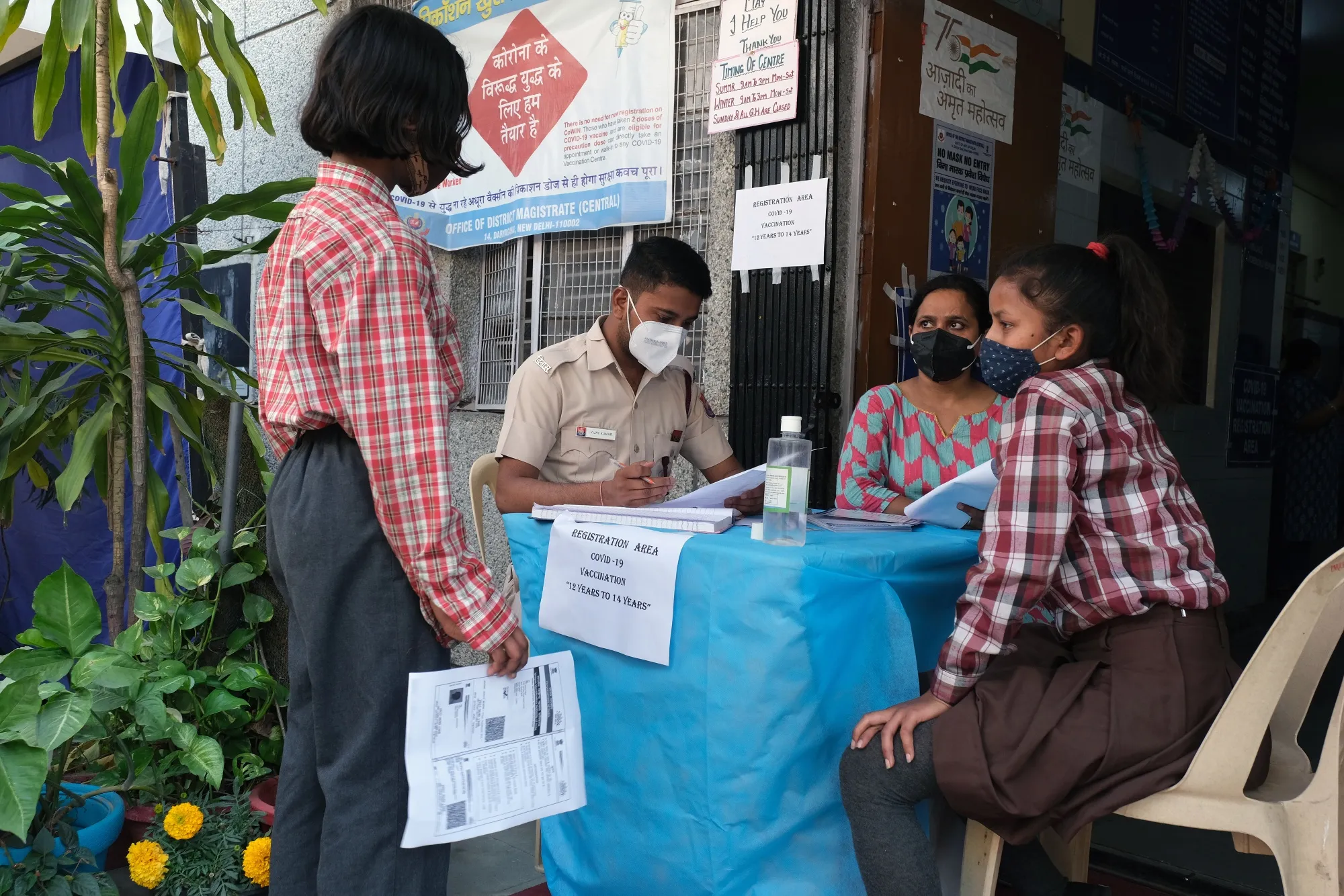 Children register at a vaccination center administering the Biological-E Ltd. Corbevax Covid-19 vaccine in New Delhi, India, on Wednesday, March 16, 2022.&nbsp;
