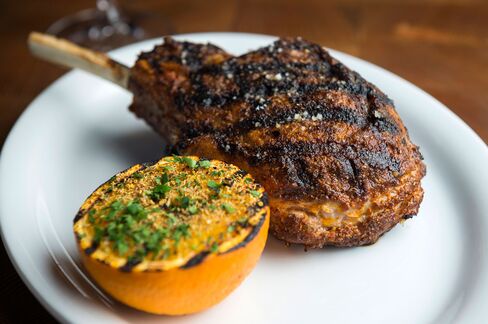 The veal chop tastes of chili and fennel, with a buttery sauce that gets better when you squeeze over an orange.