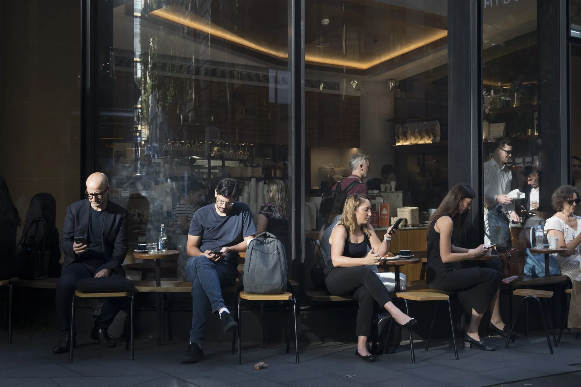 Customers at a cafe in Sydney.
