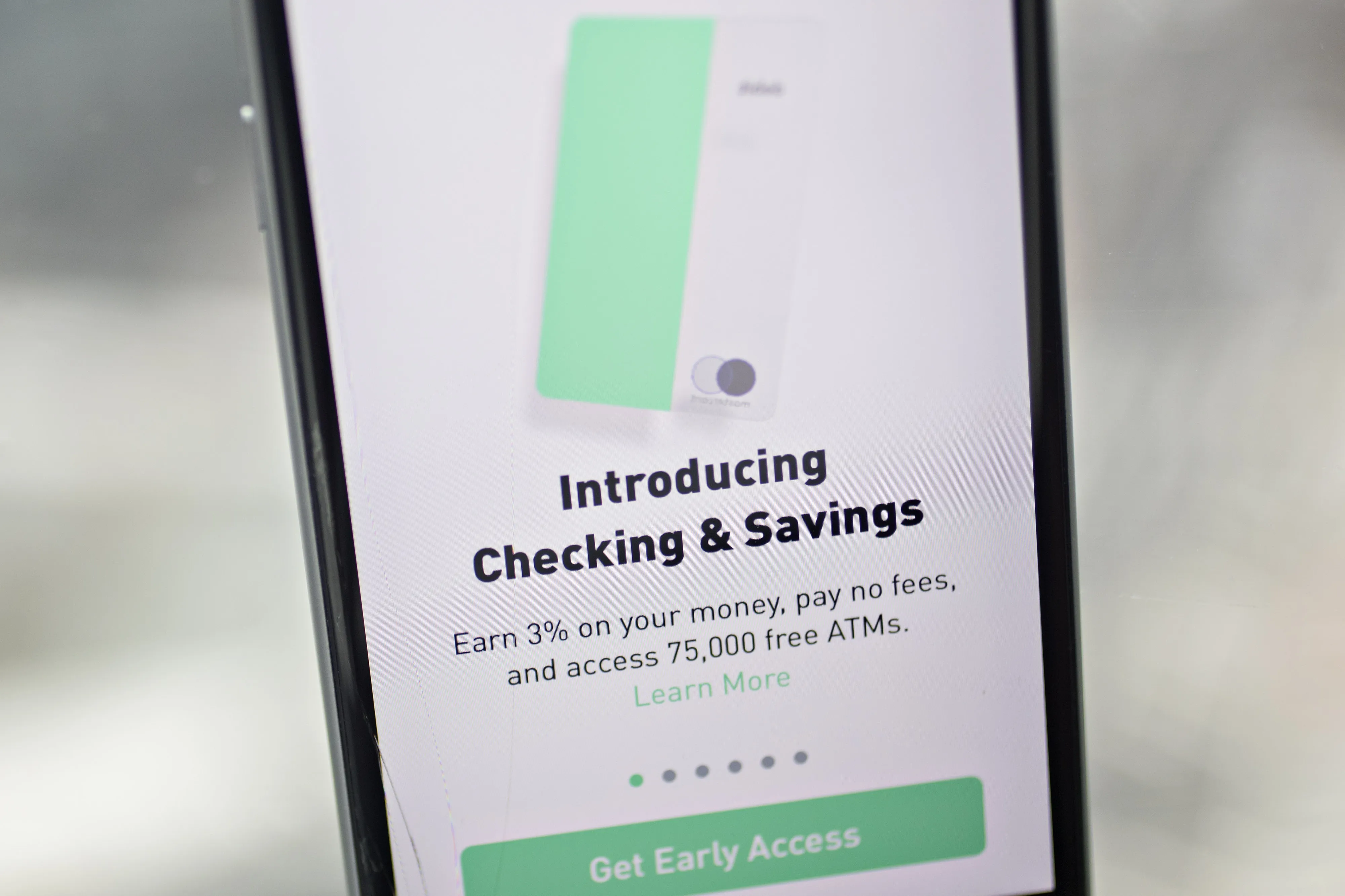The Robinhood app advertising the new Checking &amp; Savings service.