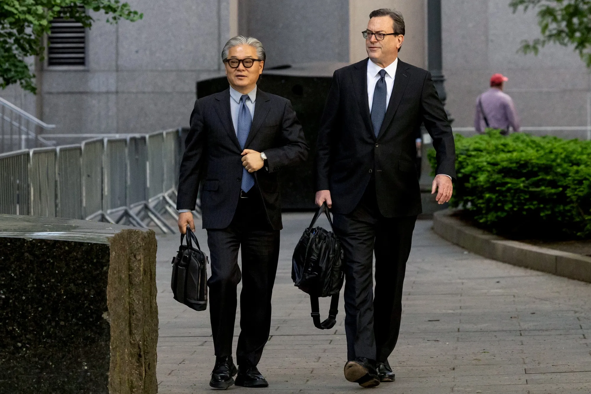 Bill Hwang, left, and his lawyer Barry Berke