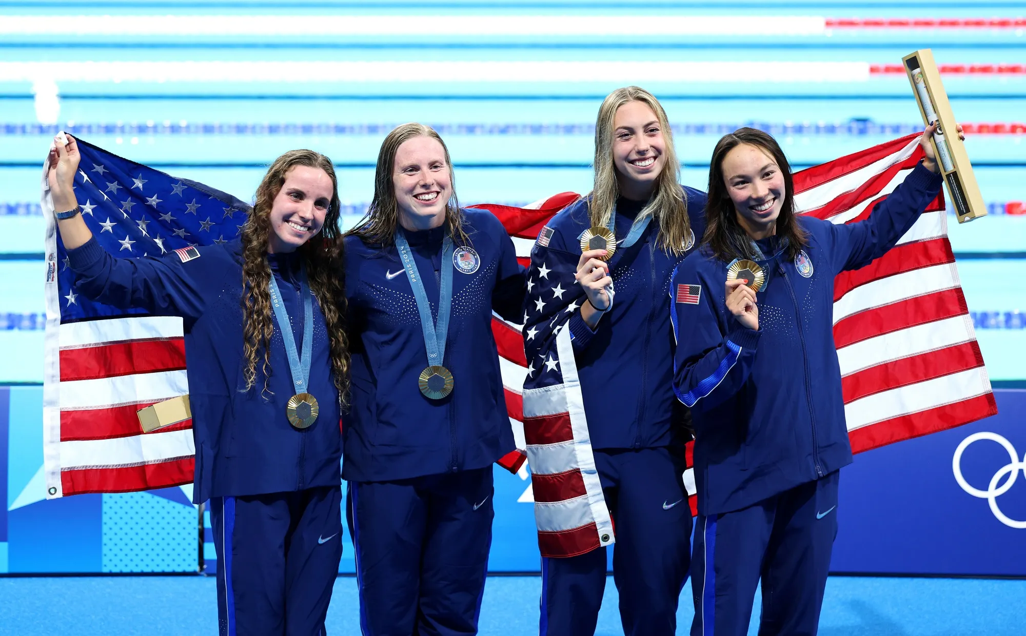 Team US Gold medal winners Regan Smith, Lilly King, Gretchen Walsh and Torri Huske following the medal ceremony for the Swimming Women’s 4x100m Medley Relay Final, in Nanterre, France, on Aug. 4.