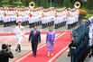 Pham Minh Chinh, centre left, and Paetongtarn Shinawatra, center right, during a welcoming ceremony in Hanoi on May 16.