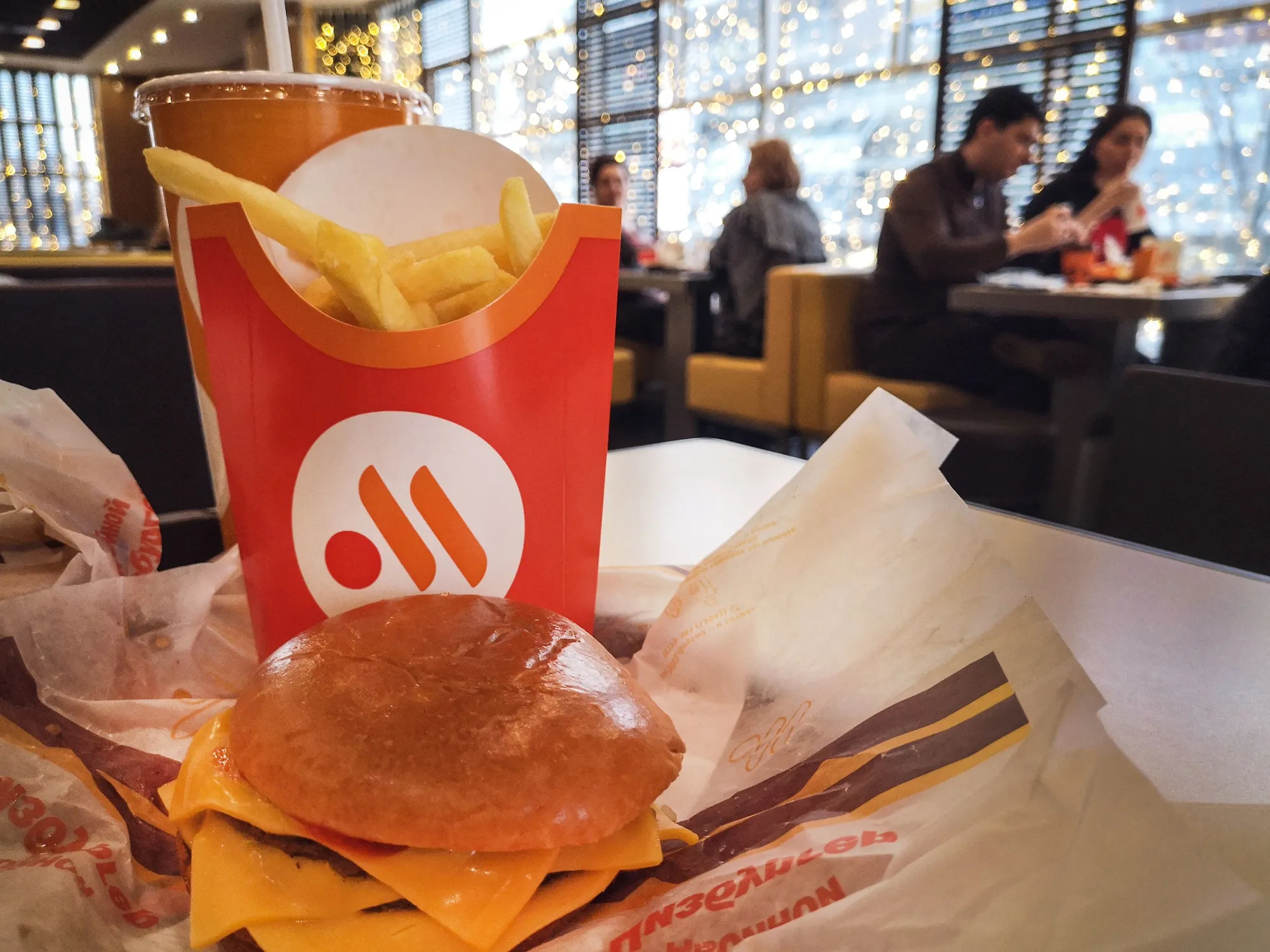 Customers dine in a “Vkusno i tochka” (tasty and that’s it!) restaurant, formerly McDonald’s Corp., in Moscow.