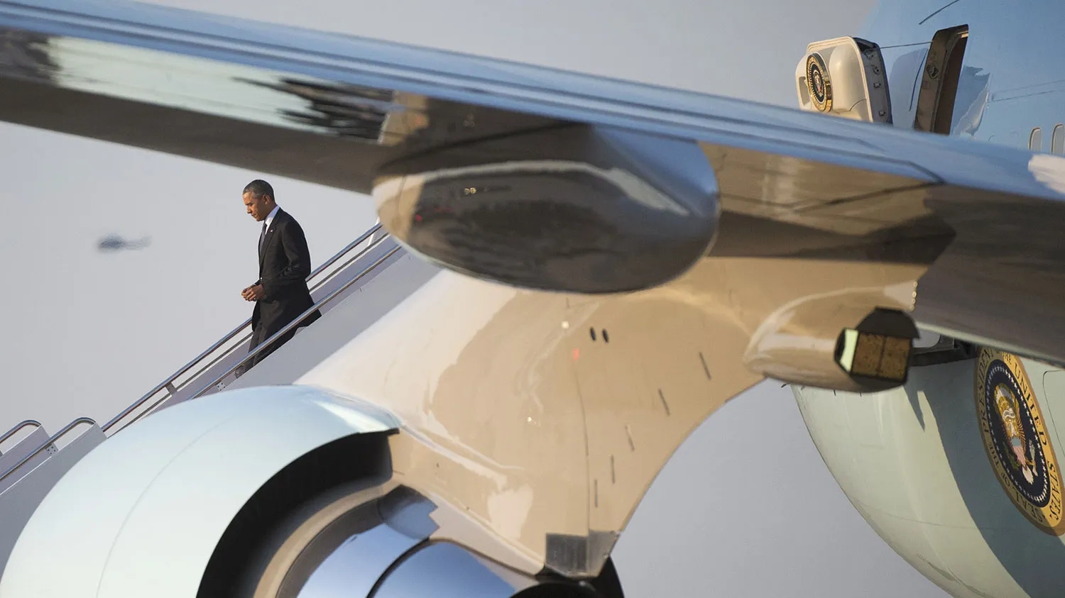 President Barack Obama walks off Air Force One at Joint Base Andrews on April 25, 2016, in Maryland.
