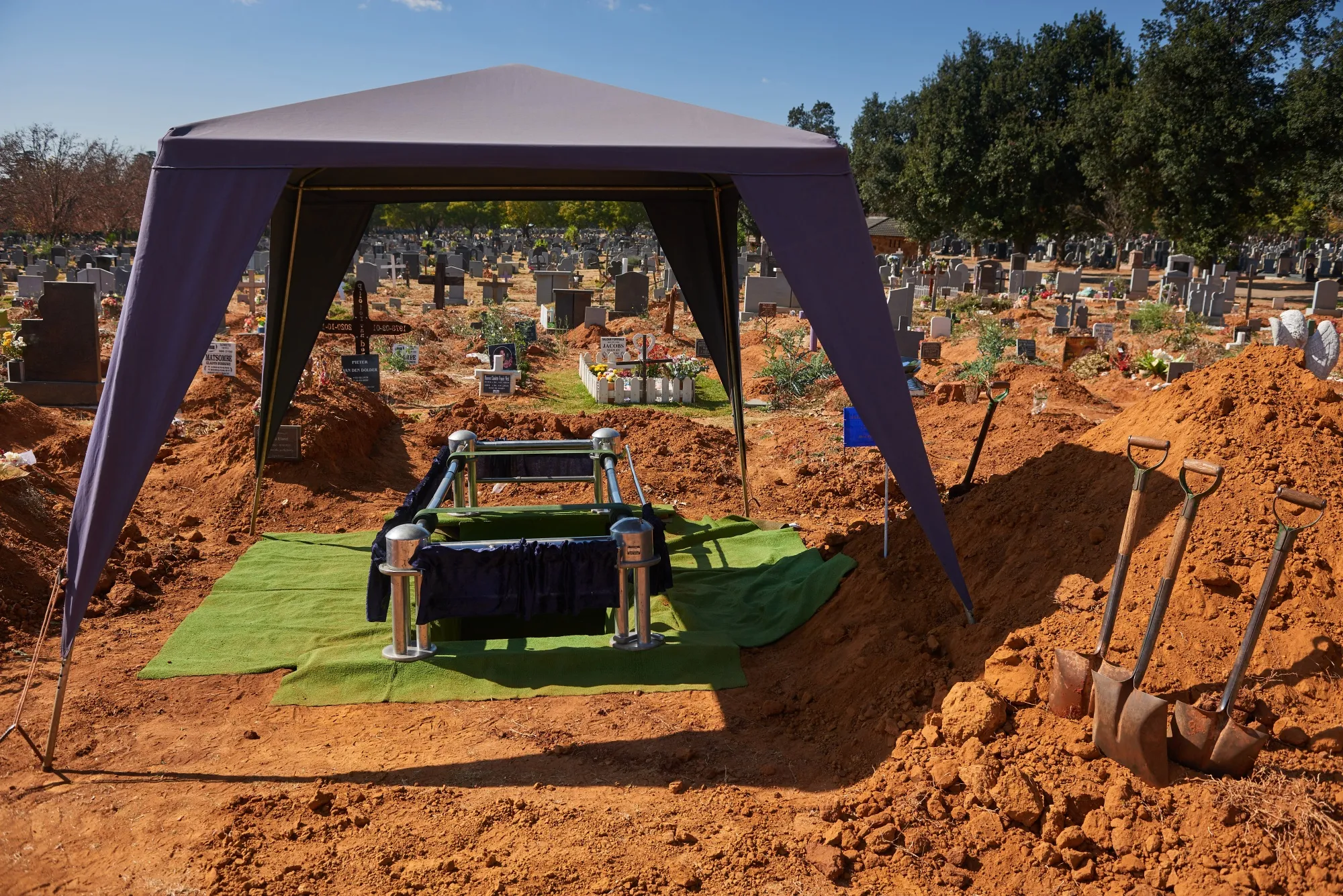A fresh grave awaits&nbsp;a funeral service at West&nbsp;&nbsp;Park Cemetery in Johannesburg, South Africa, on June 24.