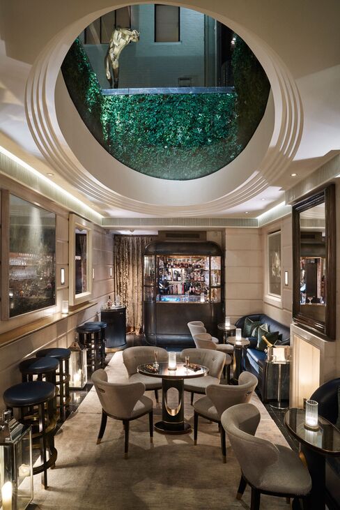 Light floods into the room from this window in the ceiling, which is inspired by the oval fountain at the front of the hotel.
